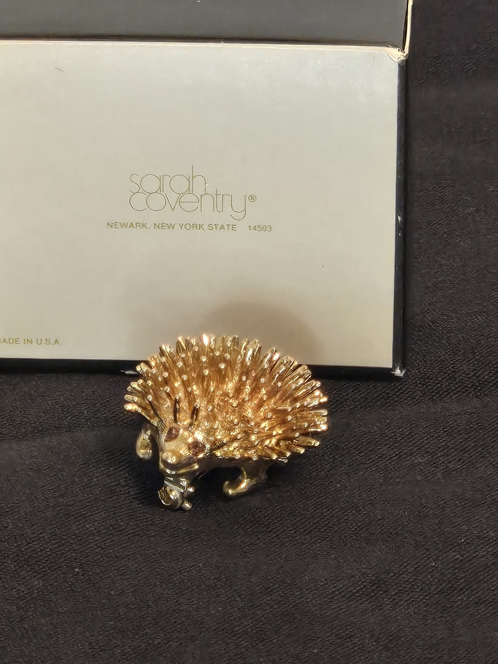 Sarah Coventry Gold Hedgehog Pin with Rhinestone Eye